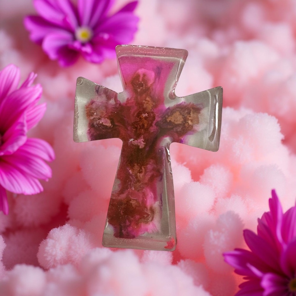 Handmade Epoxy resin cross clear with pink and brown designs.